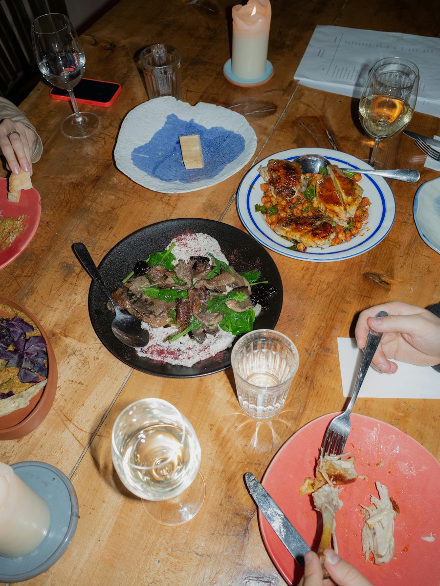 People sharing a meal together around a table